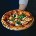 Tra sacro e profano: la doppia festa della pizza in Italia e Messico / Foto: geopop.it